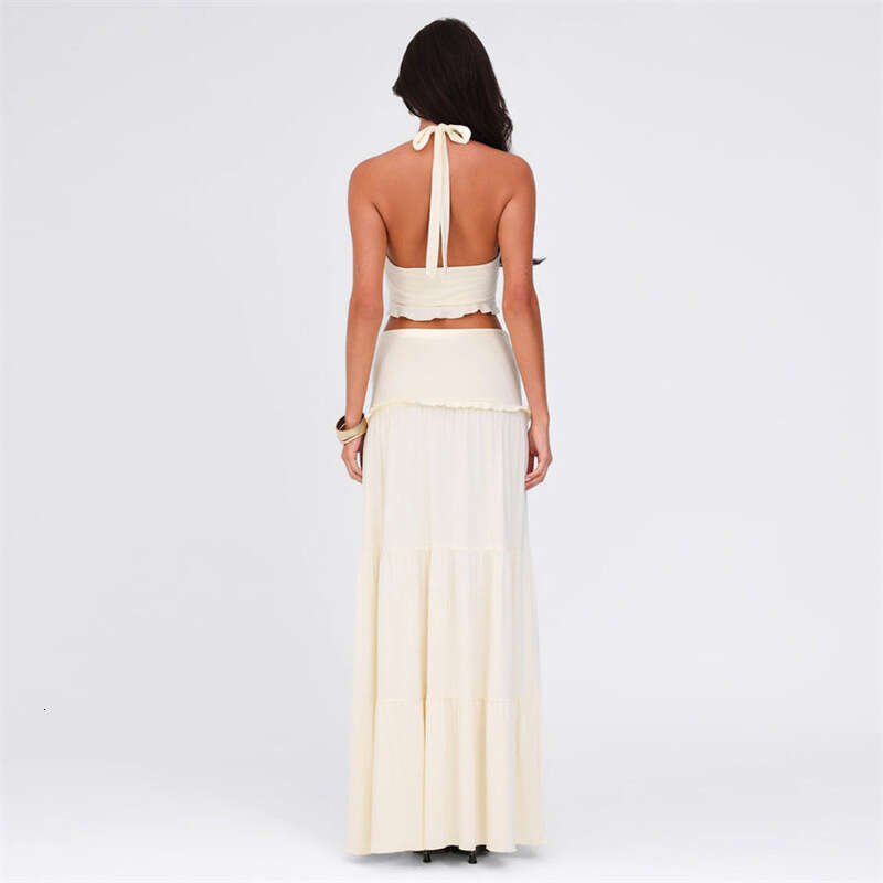2026 spring and summer women's niche fashion sexy backless and navel exposed top low waist long skirt set