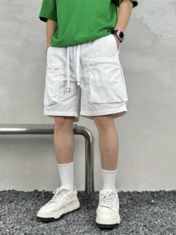 Quick drying summer multi pocket thin solid color simple loose workwear shorts for men five point casual trendy brand sports pa N260310