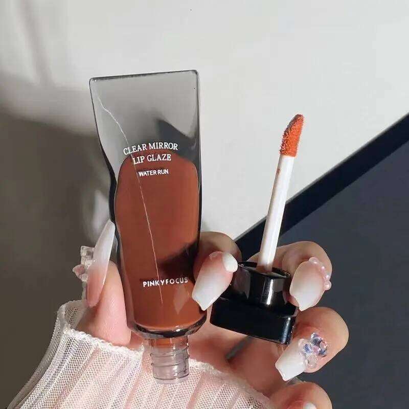 Transparent water-light glaze atmospheric pout mirror lip gloss does not take off makeup whitening lipstick Z260310