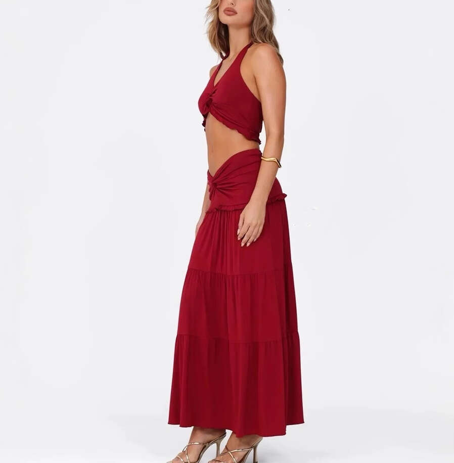 2026 spring and summer women's niche fashion sexy backless and navel exposed top low waist long skirt set
