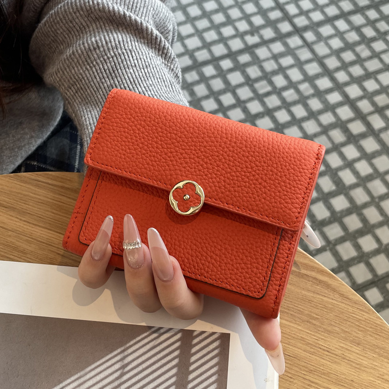 Free shipping 2026 Hot leather short wallet with multi slot buckle and fashionable trend designer card bag for woman