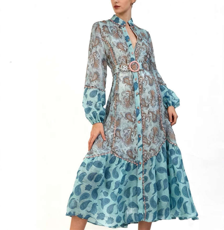 2026 spring and summer niche goddess fairy vacation style color block print lantern sleeves loose single breasted long skirt