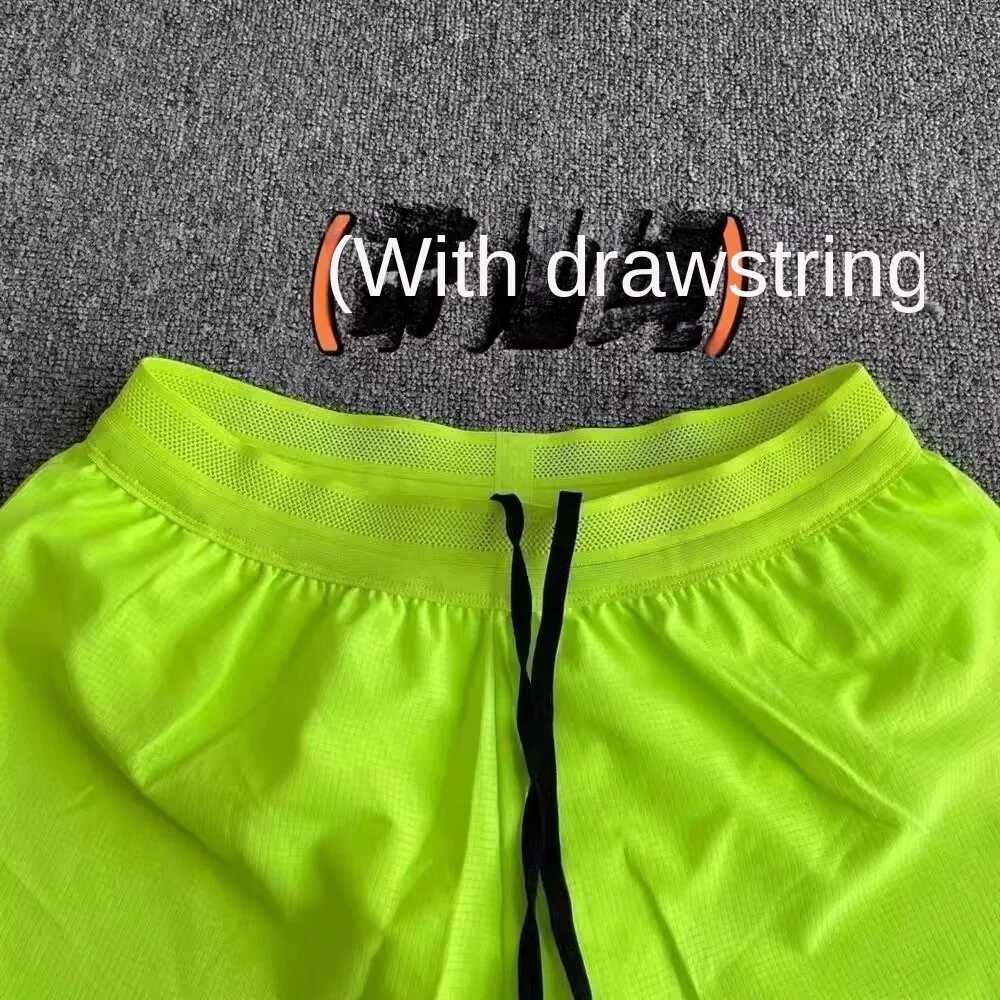 Running shorts comfortable mens sports marathon loose quick drying anti glare lining training and fitness equipment three N260310