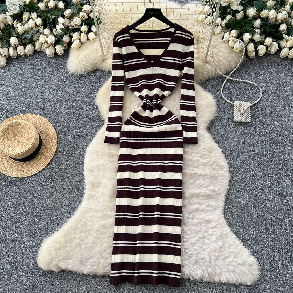 Korean style fashion retro V-neck long sleeved color blocked striped knitted women's dress autumn and winter elastic waist sweater