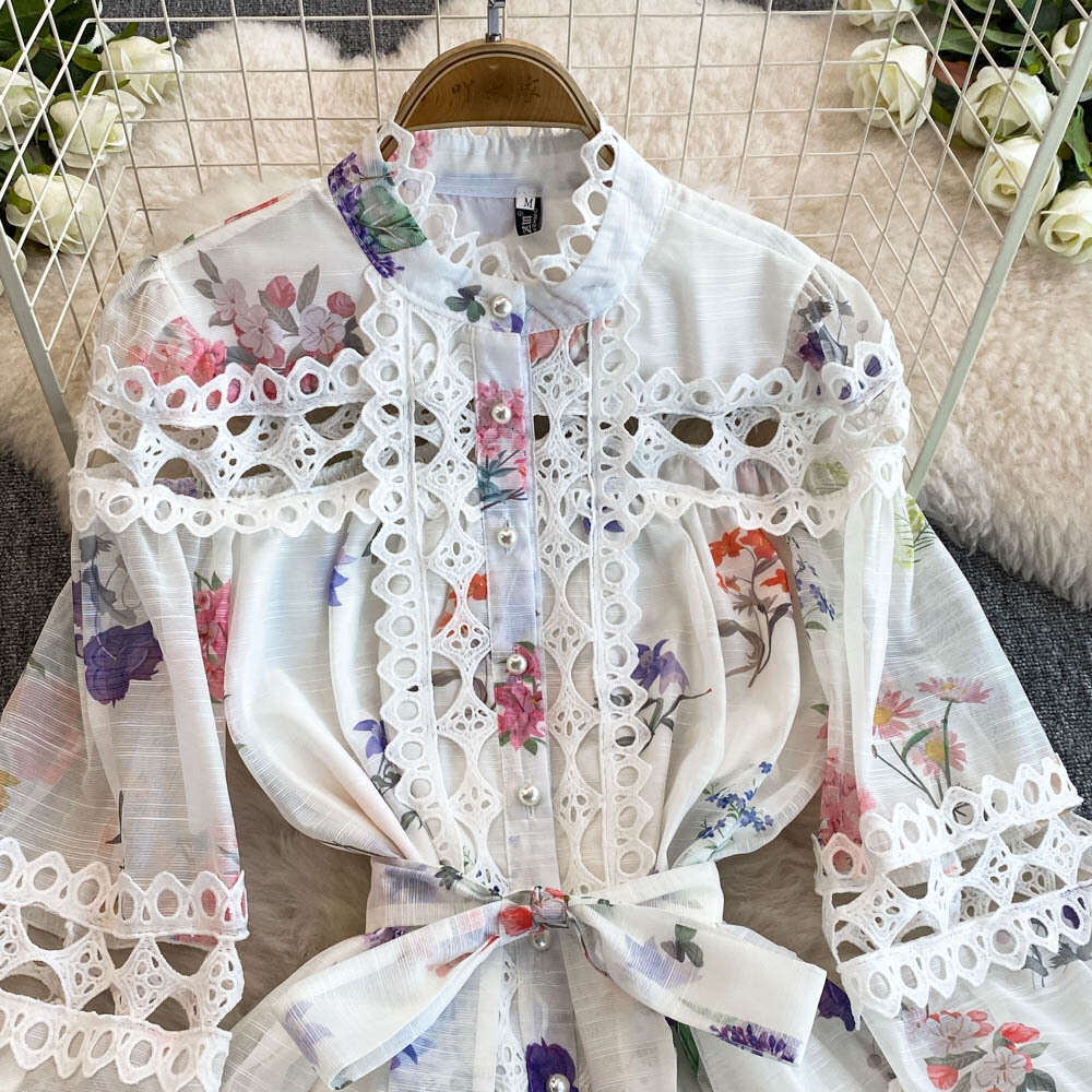 Ethnic style waist cinching slimming hollow elegant long sleeved women's autumn and winter French fashion stunning printed dress