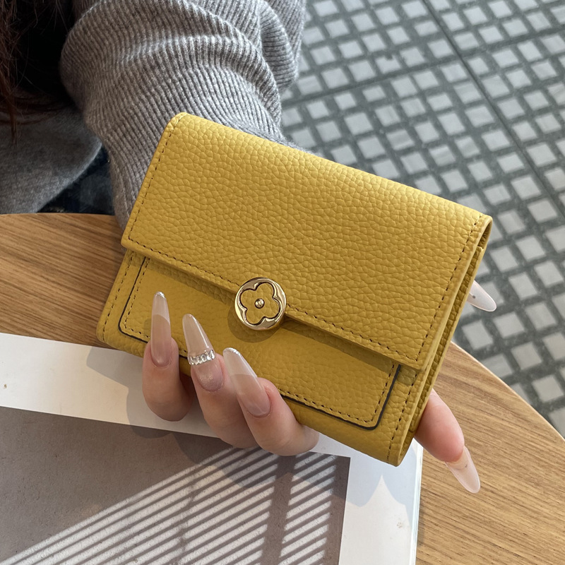 Free shipping 2026 Hot leather short wallet with multi slot buckle and fashionable trend designer card bag for woman