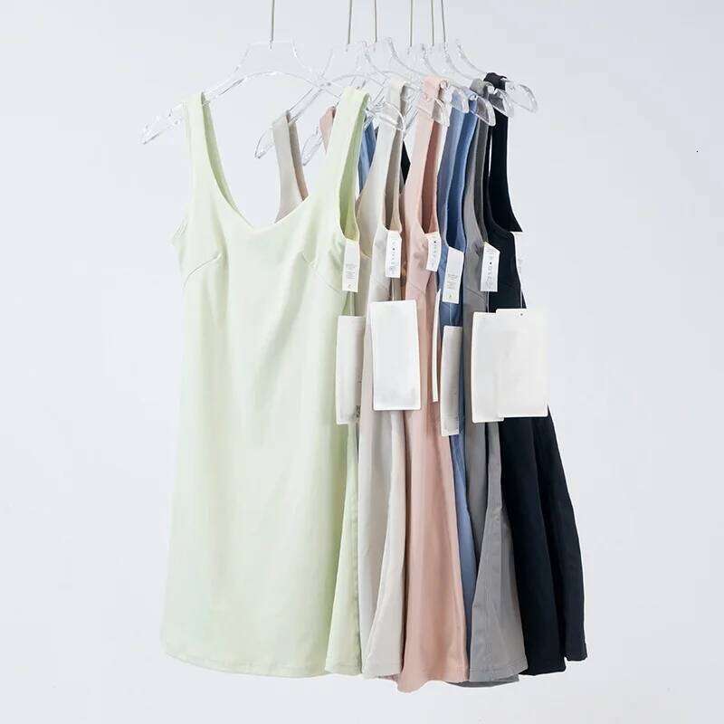 Women's sports dress with built-in short skirt lining, breathable nylon fabric. 26H0311