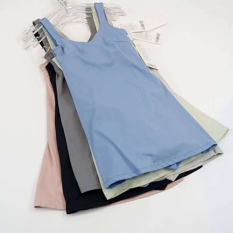 Women's sports dress with built-in short skirt lining, breathable nylon fabric. 26H0311