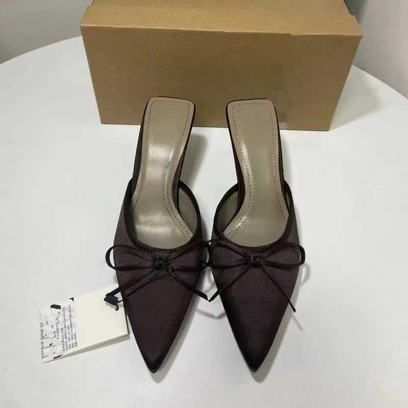 2025 Summer Womens New Butterfly Bow High Heels Muller Shoes Ladies Singles Pointed Toe Head Slippers Thin Heels Large Size K260311