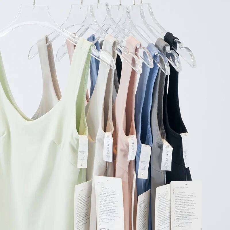 Women's sports dress with built-in short skirt lining, breathable nylon fabric. 26H0311