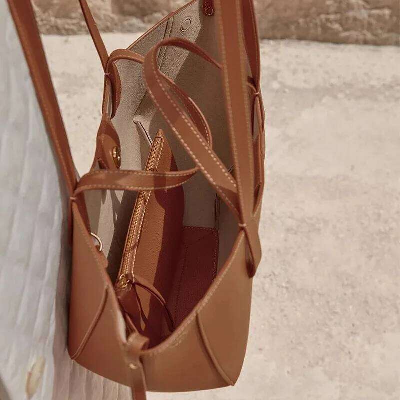 Women's large capacity leather hand-held wing pleated tote bag, casual and fashionable one shoulder underarm bag XJ260311