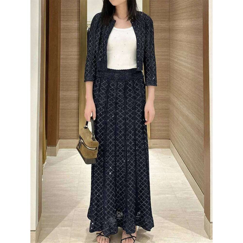 Spring/Summer New Sparkle Hollow Stripe Two Piece Set Women's Fashion Top And Skirt Mdng260311