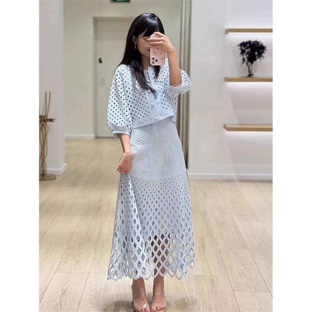 New Women's Heavy Industry Diamond Decoration Hollow Knitted Cardigan Coat Strap Dress Set Mdng260311