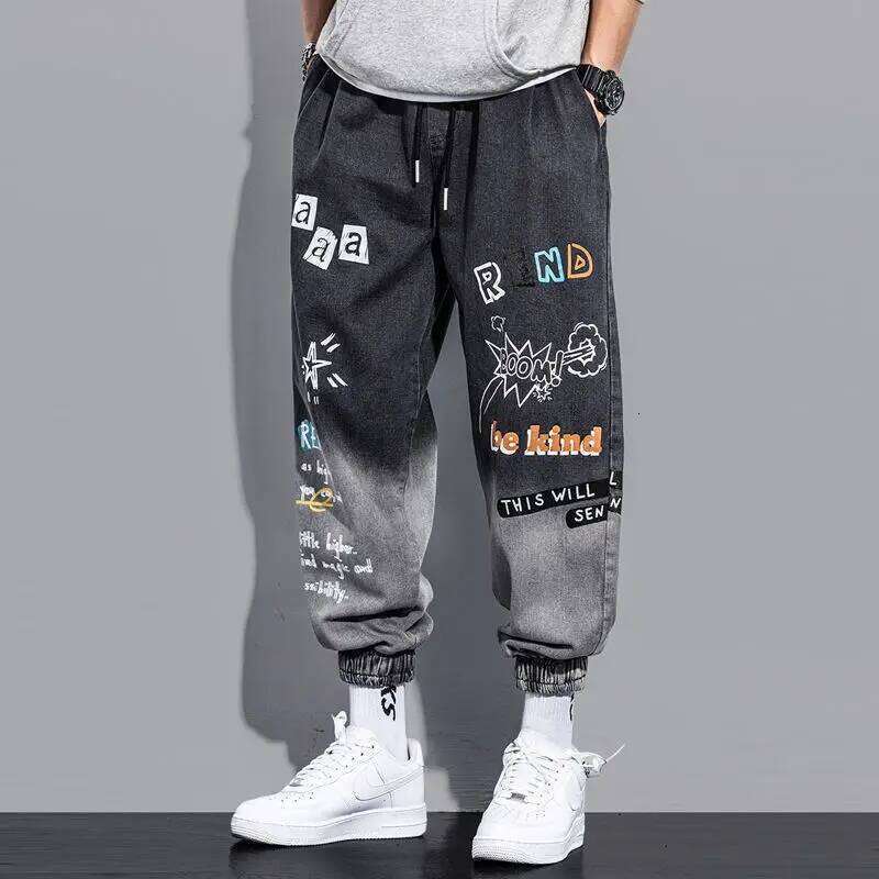 Korean Baggy Jeans Men 2024, Spray Paint Tapered with Cuffed Hem, Hip Hop Street Style Jogger Pants for College Students Z260225