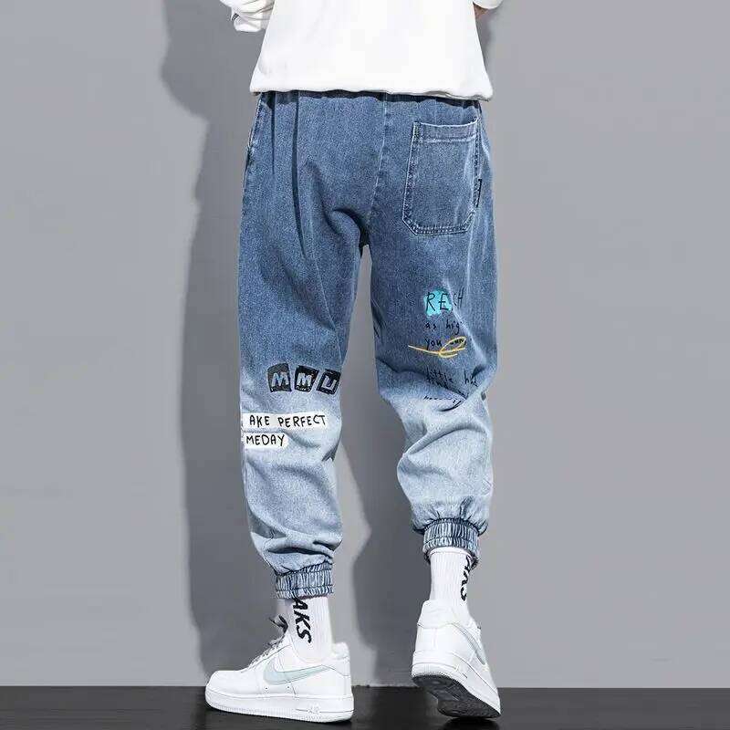 Korean Baggy Jeans Men 2024, Spray Paint Tapered with Cuffed Hem, Hip Hop Street Style Jogger Pants for College Students Z260225