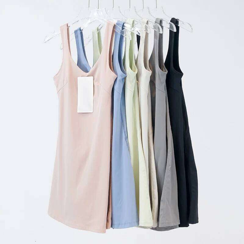 Women's sports dress with built-in short skirt lining, breathable nylon fabric. 26H0311