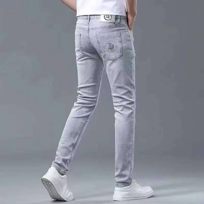 2025 Men's Slim fit Denim Pants High-quality Casual Fashion Exquisite Steel Print Pattern Suitable Youth Couples Z260225