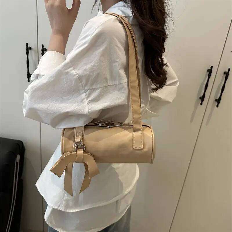 Trendy Cool Bowknot Tubular Cylindrical PU Shoulder Girly Handbag Armpit Bag Women Fashion Design Sense Commuter Bags Gifts XJ260311