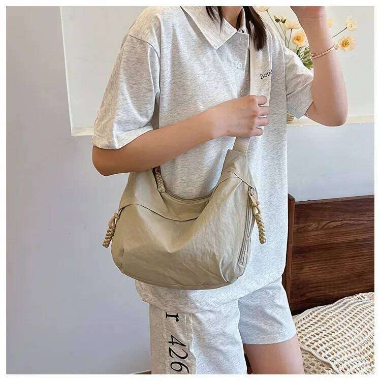 Fashionable and minimalist Korean version dumpling popular this year, new high-quality shoulder bag, large capacity tote cr XJ260311