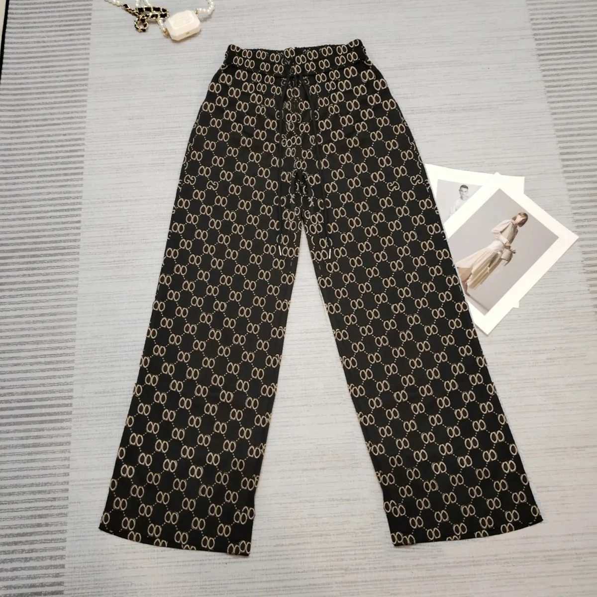 2025 Spring and Autumn New Womens Full Print Jacquard Casual Pants Elastic Waist Versatile Wide Leg PantsT260311