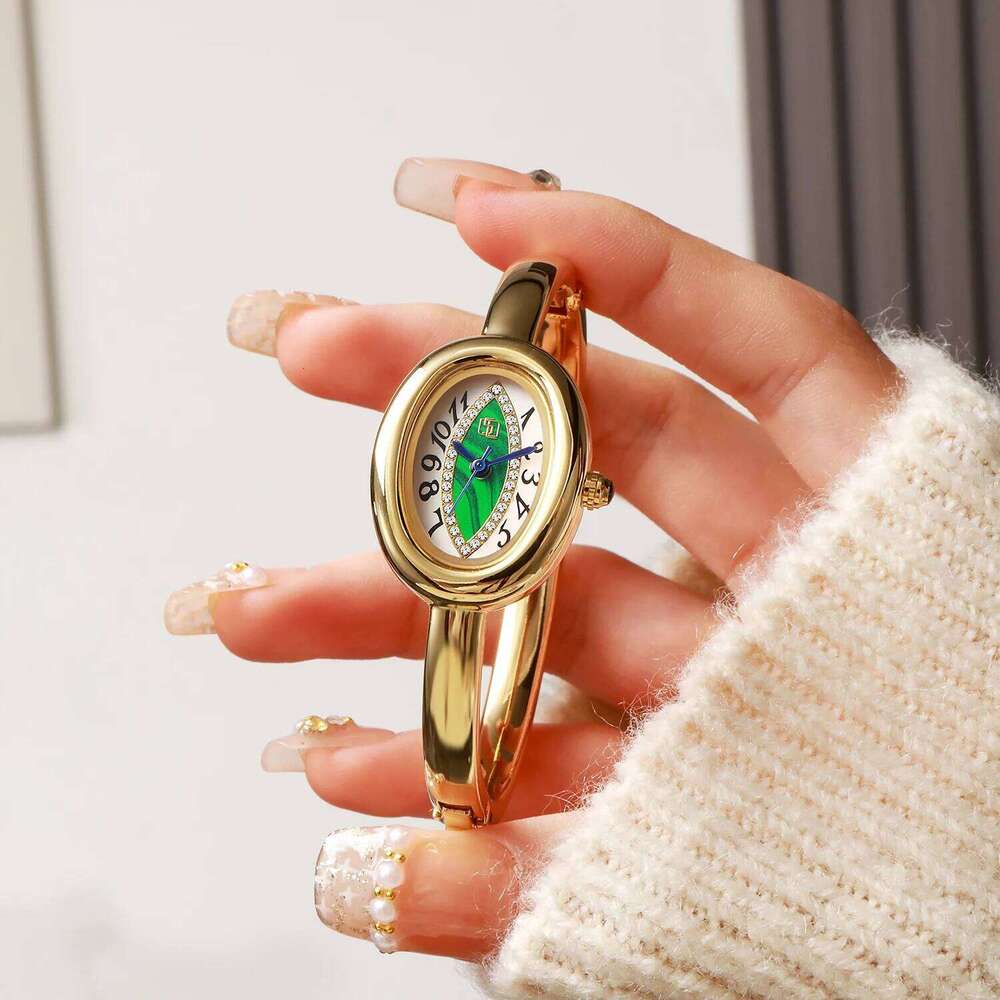 luxury elegant ladies bracelet eye pupil Arabic numeral dial inlaid with diamond oval waterproof women quartz watch Reloj