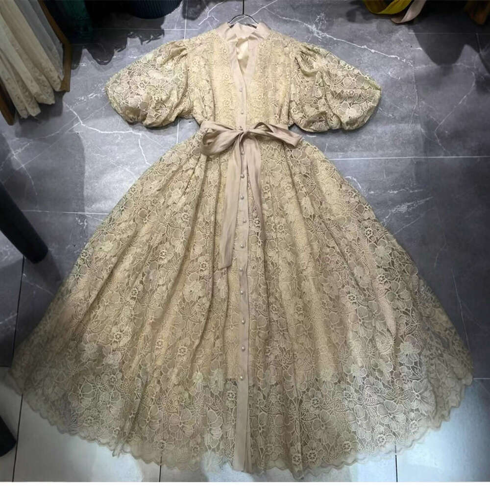 2026 new European and American niche retro palace style goddess simple solid color lantern A14 sleeves loose lace up cardigan long skirt