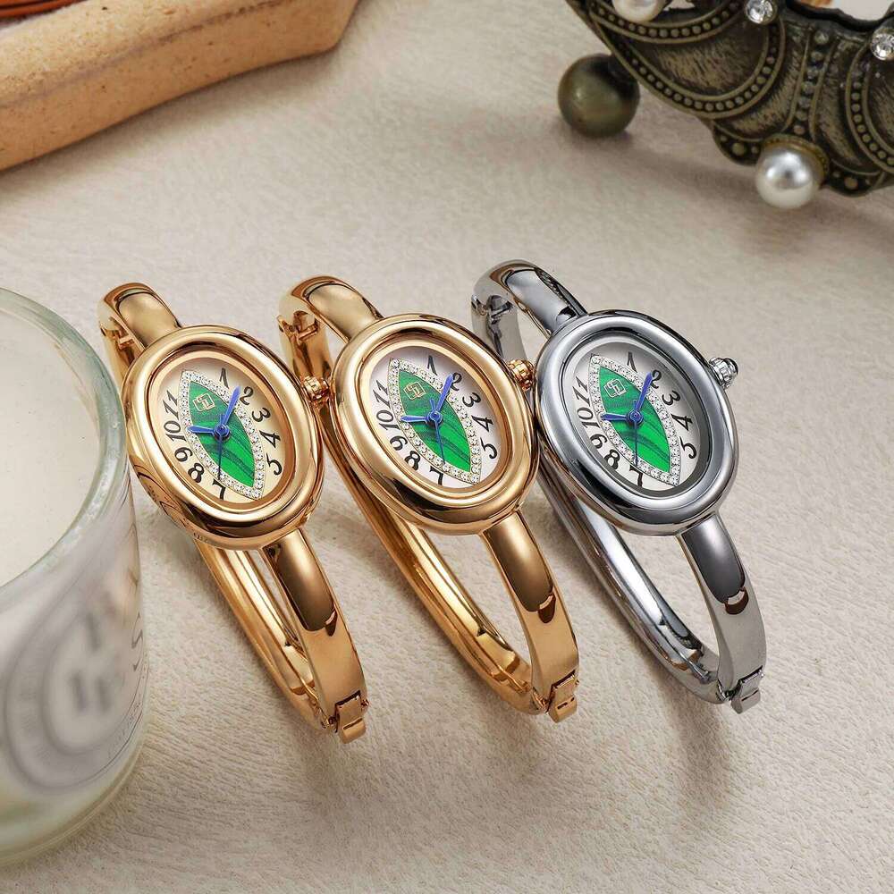 luxury elegant ladies bracelet eye pupil Arabic numeral dial inlaid with diamond oval waterproof women quartz watch Reloj