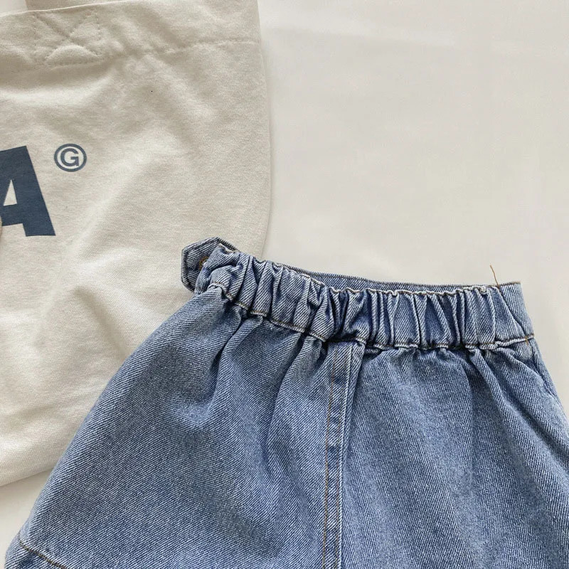 Korean Fashion Summer Kids Girl Skirt Shorts Solid Elastic Waist Button Soft Denim Culotte Children Versatile Clothing 260311