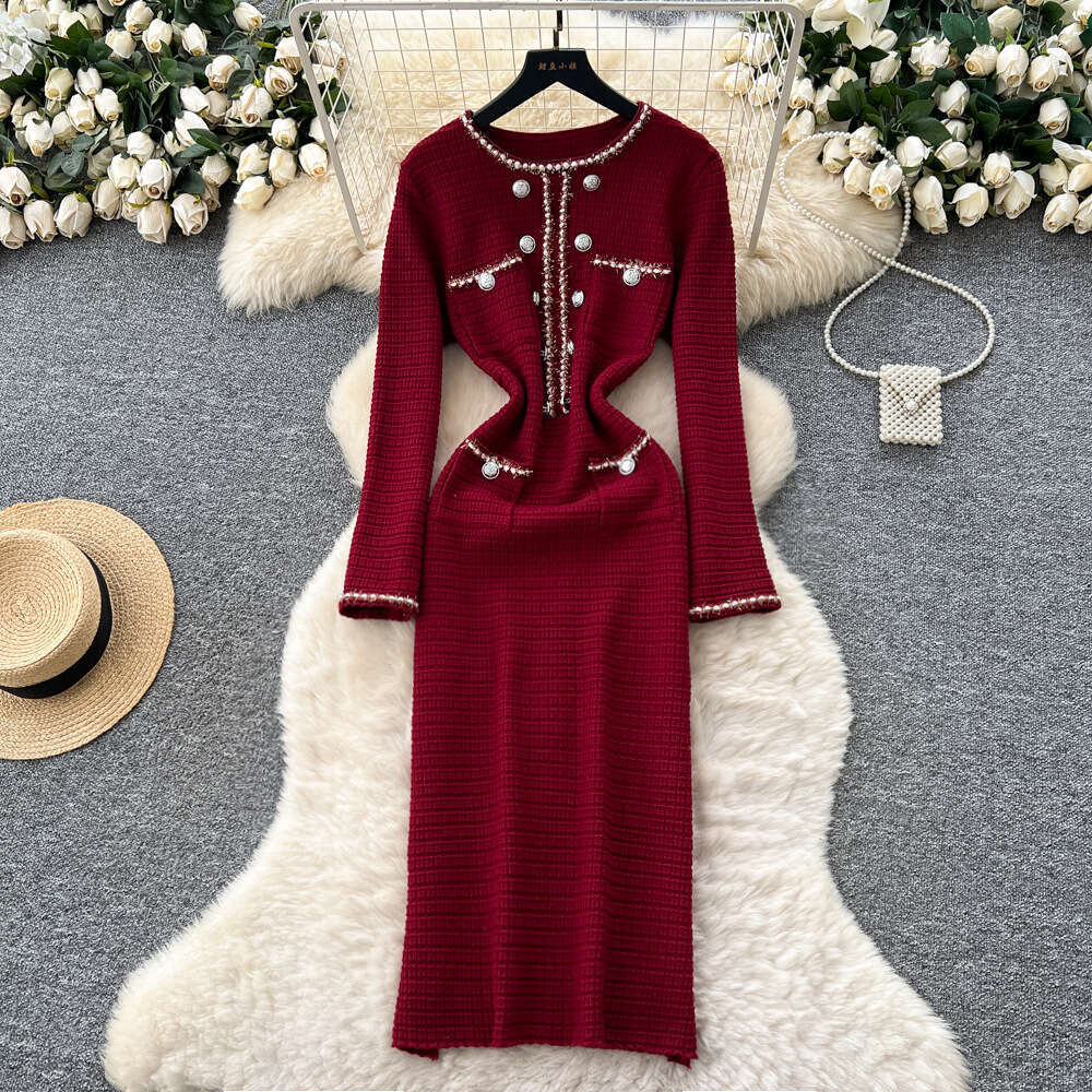 Women's dress 2026 autumn a16 and winter French high-end style metal button waist slimming elegant knitted fabric