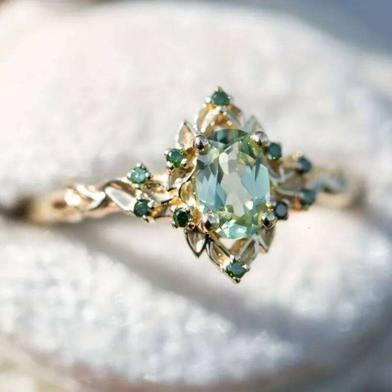 European and American new fashion flower shape green gemstone inlaid elegant light women's ring H260312