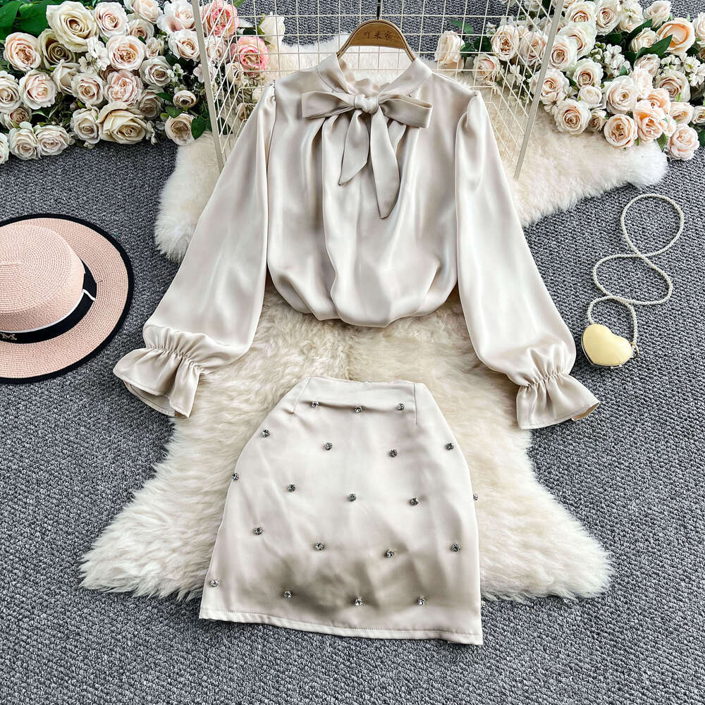 Designer socialite high-end two-piece set for women 2026 new French a20 bow satin shirt Rhinestone skirt