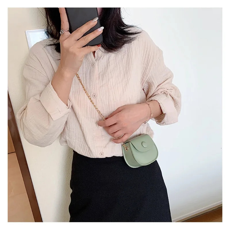 mini fashion Korean childrens shoulder bag trend Joker girl chain small round change messenger 260311