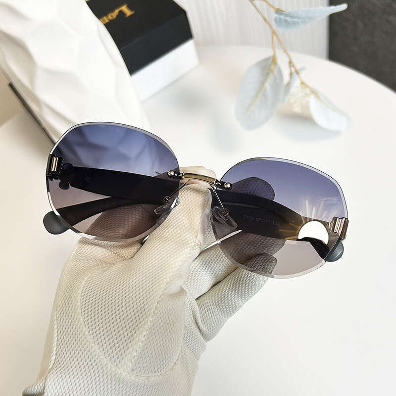 Designer Sunglasses for Women Classic Fashion Popular Oval Rimless frame Gradient lenses Beach Daily Sun Glasses Wave Clover Temple