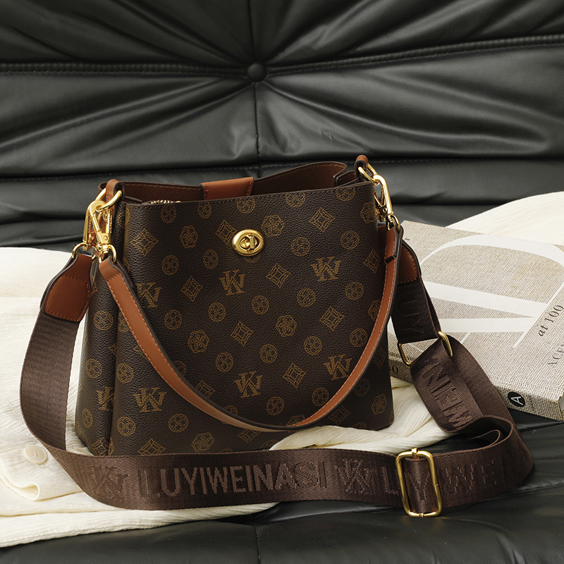 High-end large-capacity handbag, new retro bucket bag, versatile stylish shoulder crossbody bag, printed luxury handbag, simple and casual handheld un