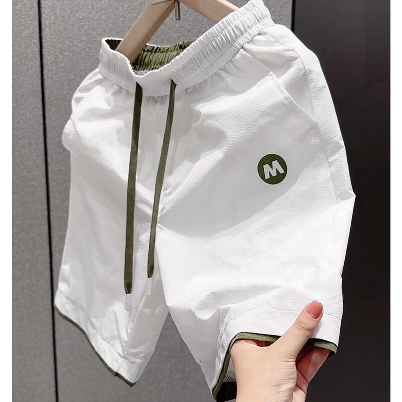 2026 New Designer Luxury Brand Men's Summer Lightweight Shorts Men's European Style Medium Length Breathable Quick Drying Beach Pants Fashio