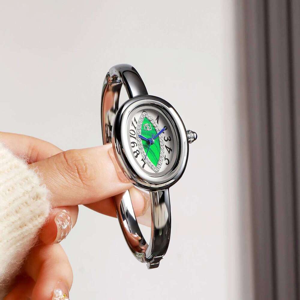 luxury elegant ladies bracelet eye pupil Arabic numeral dial inlaid with diamond oval waterproof women quartz watch Reloj