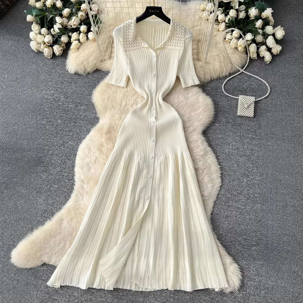 a25 2026 vintage Hepburn style bead embellishment lapel knit women's autumn and winter single breasted waist with elegant fishtail long skirt