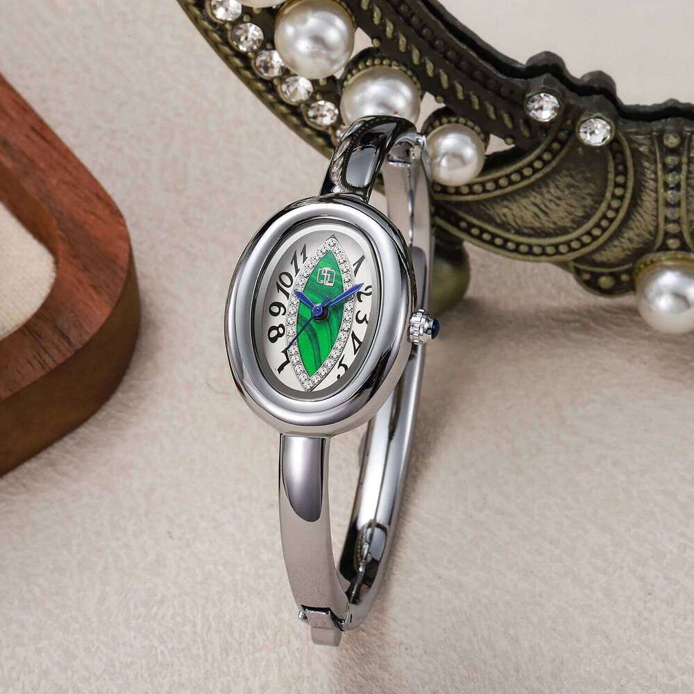 luxury elegant ladies bracelet eye pupil Arabic numeral dial inlaid with diamond oval waterproof women quartz watch Reloj