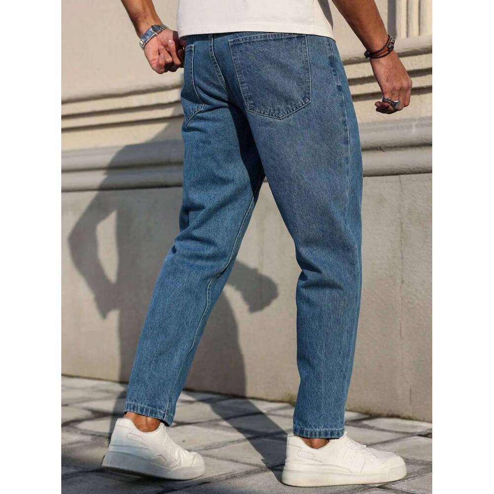 Men's jeans are made of classic blue denim fabric with a loose fit, making them an indispensable versatile item in the wardrobe.