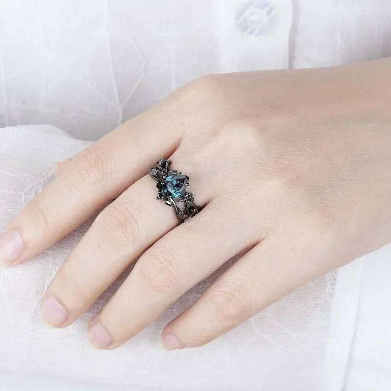 European and American fashion gun black inlaid sea blue zircon women's ring H260312