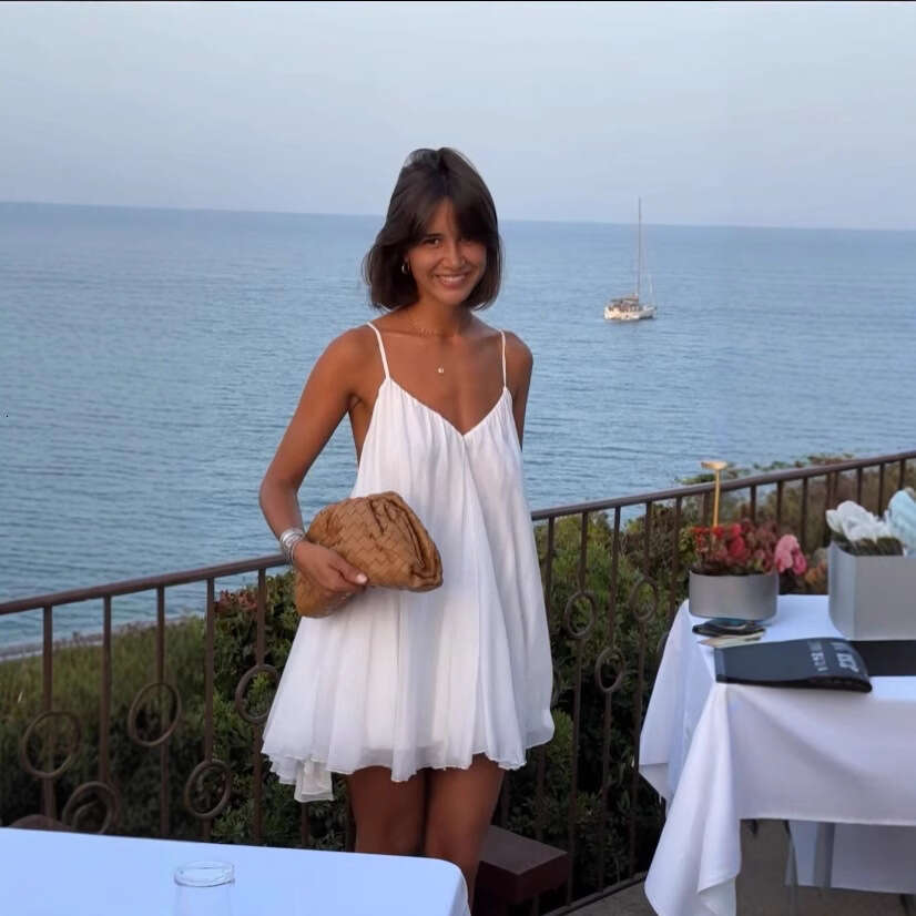 2025 Summer New French Style Beach Vacation Fashion Versatile Backless Mini Strap Dress