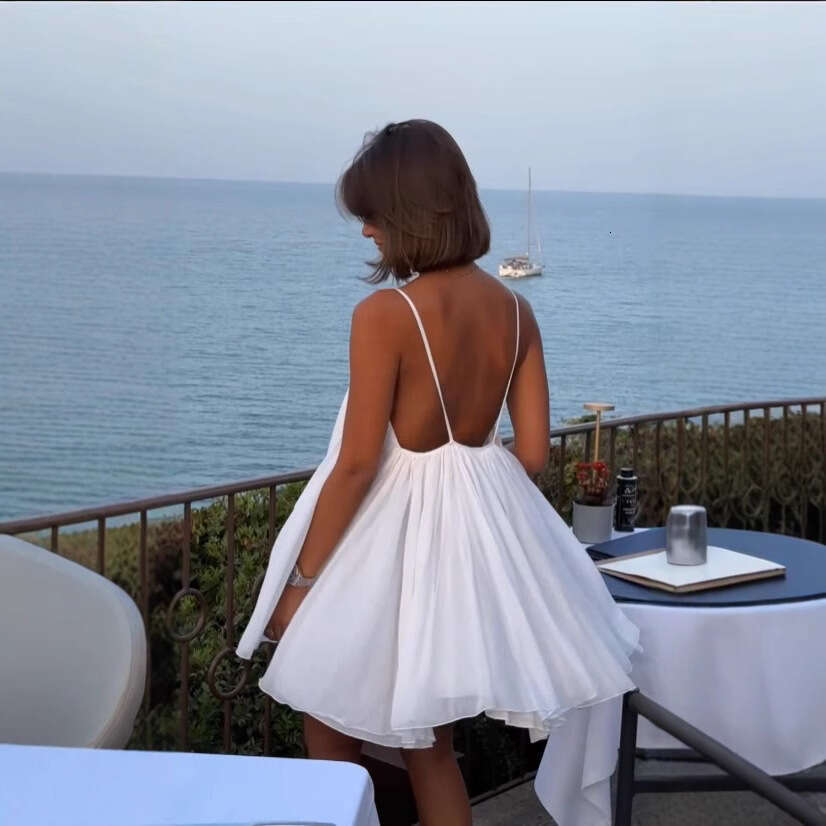 2025 Summer New French Style Beach Vacation Fashion Versatile Backless Mini Strap Dress