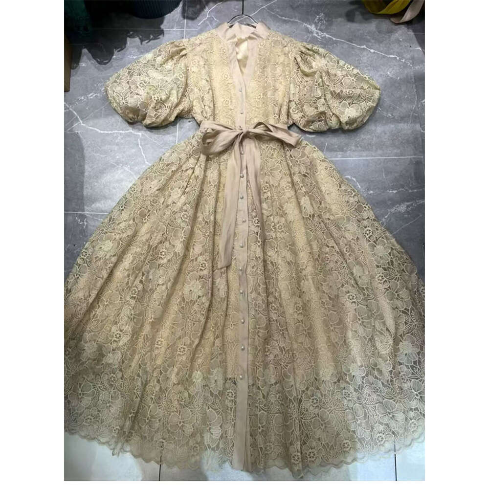A15 2026 new European and American niche retro palace style goddess simple solid color lantern sleeves loose lace up cardigan long skirt