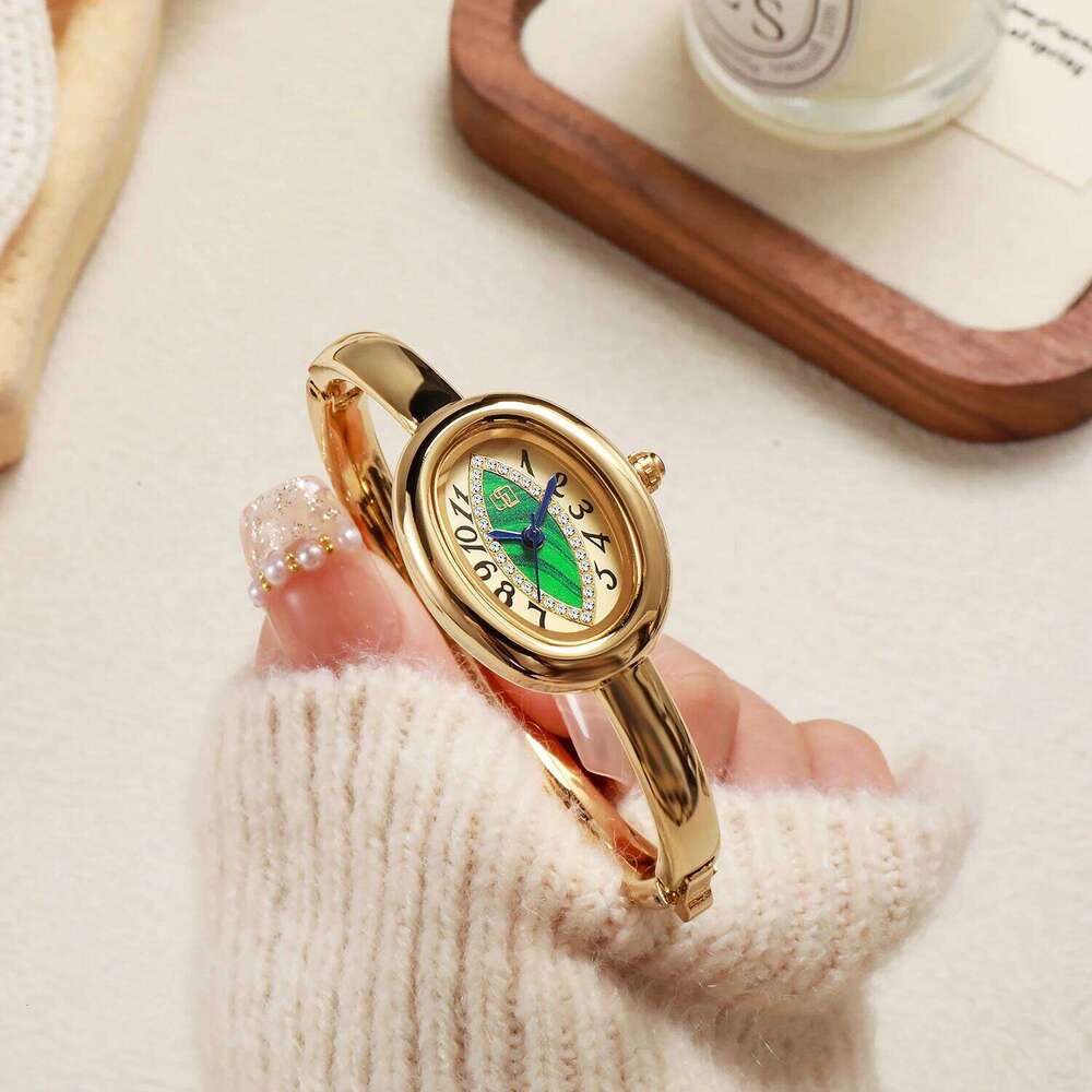 luxury elegant ladies bracelet eye pupil Arabic numeral dial inlaid with diamond oval waterproof women quartz watch Reloj