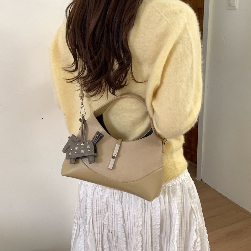New high-end niche design cowhide dumpling bag multifunctional elegant handbag shoulder bag women's crossbody bag designer bag