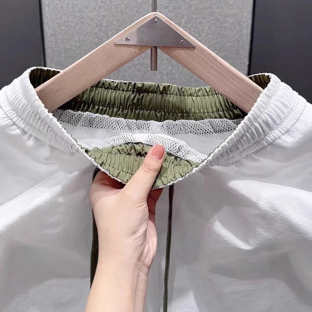 2026 New Designer Luxury Brand Men's Summer Lightweight Shorts Men's European Style Medium Length Breathable Quick Drying Beach Pants Fashio