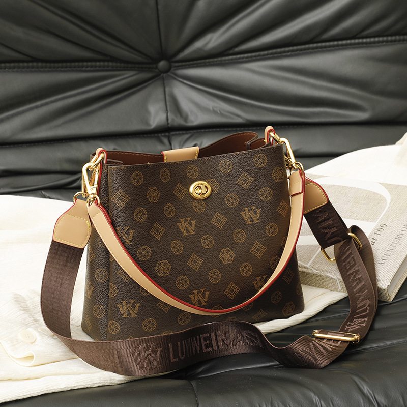 High-end large-capacity handbag, new retro bucket bag, versatile stylish shoulder crossbody bag, printed luxury handbag, simple and casual handheld un