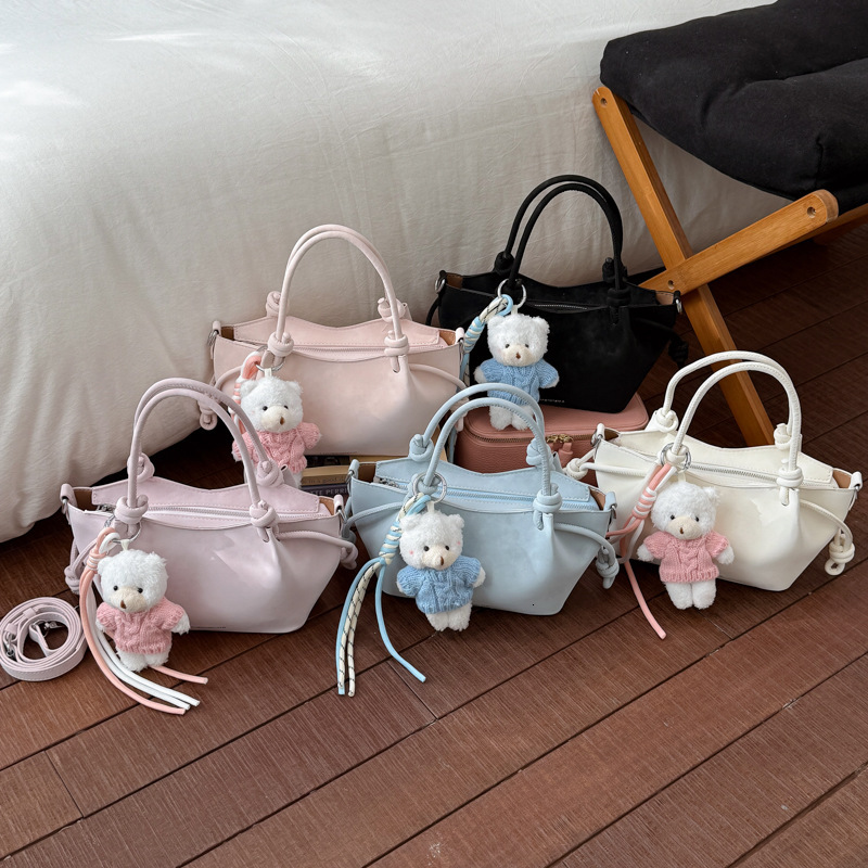 Elegant women's bucket shaped bag spring new retro casual commuting multifunctional shoulder bag crossbody bag handbag designer bag