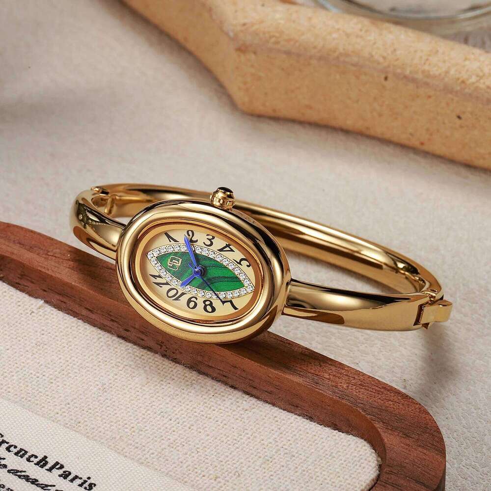 luxury elegant ladies bracelet eye pupil Arabic numeral dial inlaid with diamond oval waterproof women quartz watch Reloj