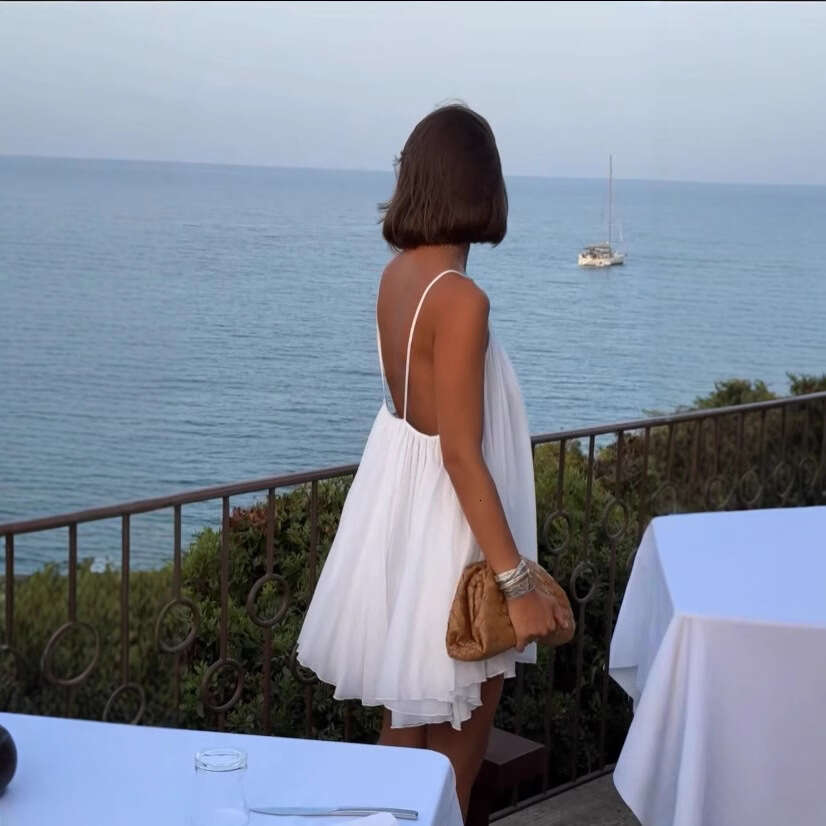 2025 Summer New French Style Beach Vacation Fashion Versatile Backless Mini Strap Dress